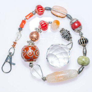 Suncatcher with red glass patterned beads