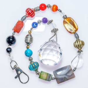 Suncatcher with a rainbow of coloured glass and metal beads
